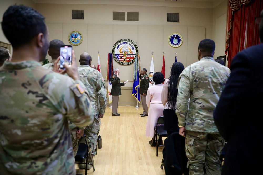 Promotion ceremony for Deputy G4, CW4 Pierre Ligonde