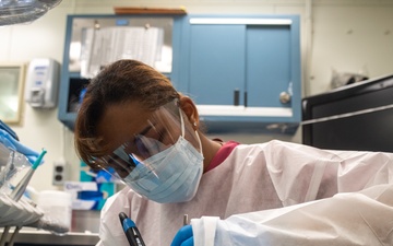 USS Ronald Reagan (CVN 76) Sailors perform dental cleaning