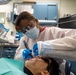 USS Ronald Reagan (CVN 76) Sailors perform dental cleaning