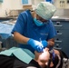 USS Ronald Reagan (CVN 76) Sailors perform dental cleaning