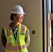 Commander Jamie Rivas conducts a site tour of an active construction project