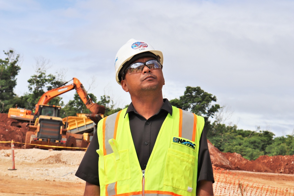 A safety specialist with the Office in Charge of Construction Marine Corps Marianas conducts a site visit