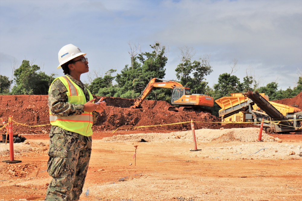 A Civil Engineer Corps officer conducts a site visit on an active construction project in Guam