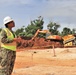 A Civil Engineer Corps officer conducts a site visit on an active construction project in Guam