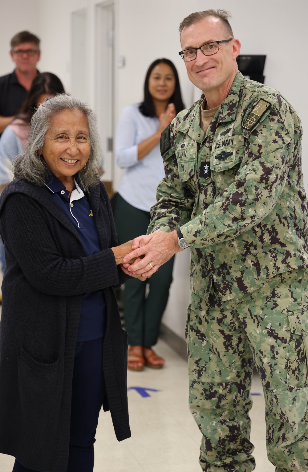 NAVFAC PAC Commander presents coin to NAVFAC Hawaii employees