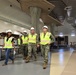 OICC staff walk through a nearly-completed dining facility on the new Marine Corps Base Camp Blaz