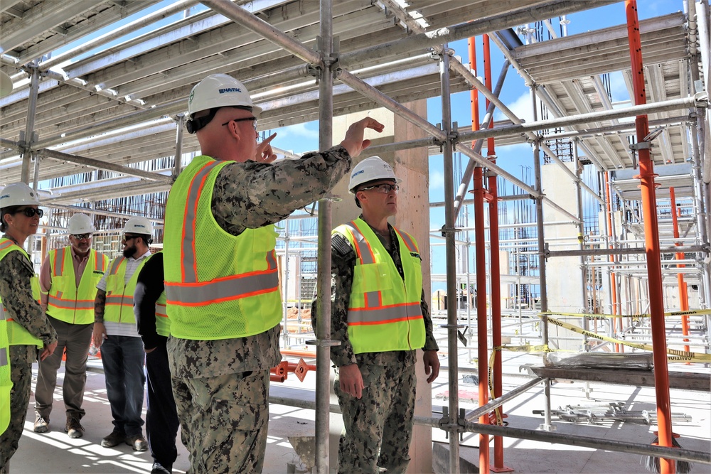 Captain Blake Burket leads a tour of active construction sites on Marine Corps Base Camp Blaz