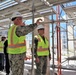 Captain Blake Burket leads a tour of active construction sites on Marine Corps Base Camp Blaz