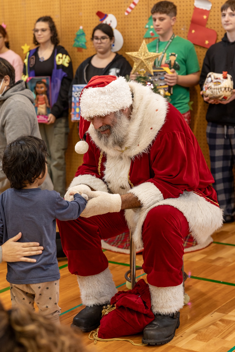 The Merry Marine Toy Drive gifts toys to Koza Child Guidance Center