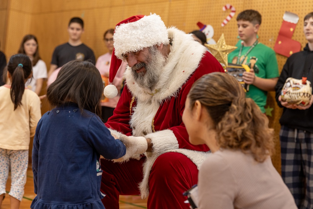 The Merry Marine Toy Drive gifts toys to Koza Child Guidance Center