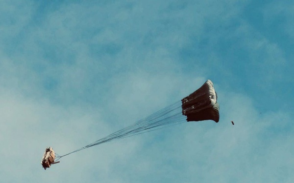 Two G11 Parachutes mid-extraction as the U.S. Army 16ft Type V Platform begins descent