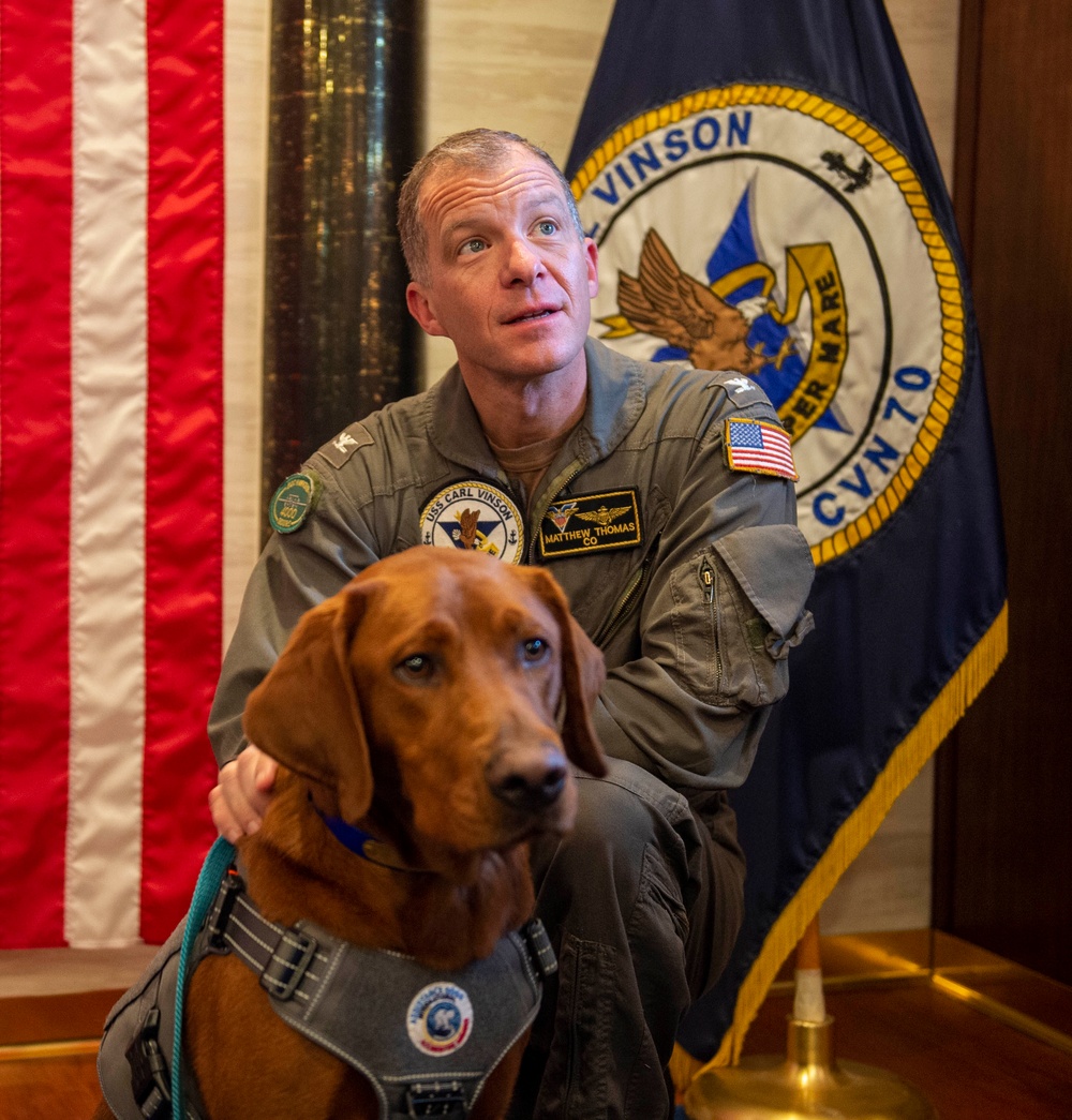 USS Carl Vinson (CVN 70) Welcomes Rudder, a Mental Health Facility Dog