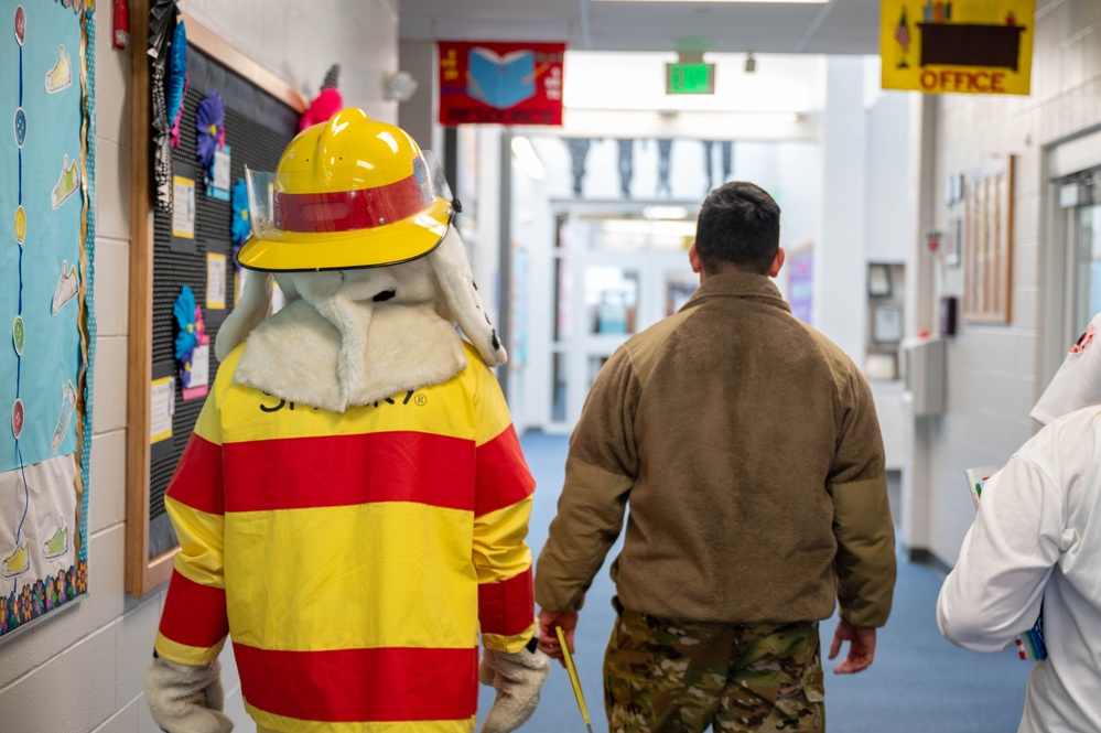 F.E. Warren Fire Department reading at Freedom Elementary