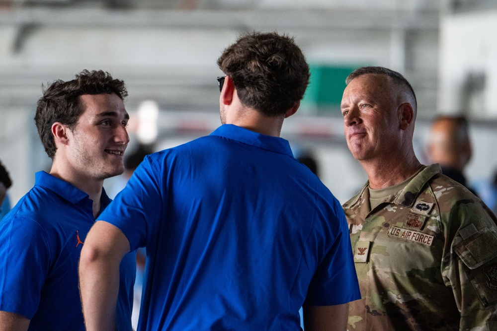 UF Gators and TU Green Wave football teams visit MacDill AFB ahead of Gasparilla Bowl