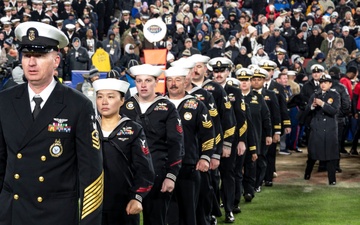 U.S. Navy Recruiters of the Year walk onto the Field for an Swear in Ceremony during the Army Navy Game