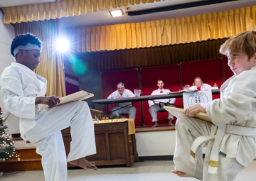 Black belts and boundary lines: Real estate specialist lives a double life of discipline and defense