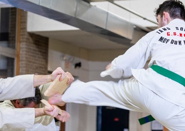 Black belts and boundary lines: Real estate specialist lives a double life of discipline and defense