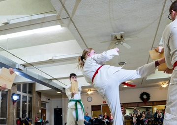 Black belts and boundary lines: Real estate specialist lives a double life of discipline and defense