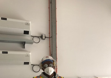 U.S. Army Corps of Engineers Middle East District Civil Engineer Adam Alamin visiting a construction site on a project in Qatar.