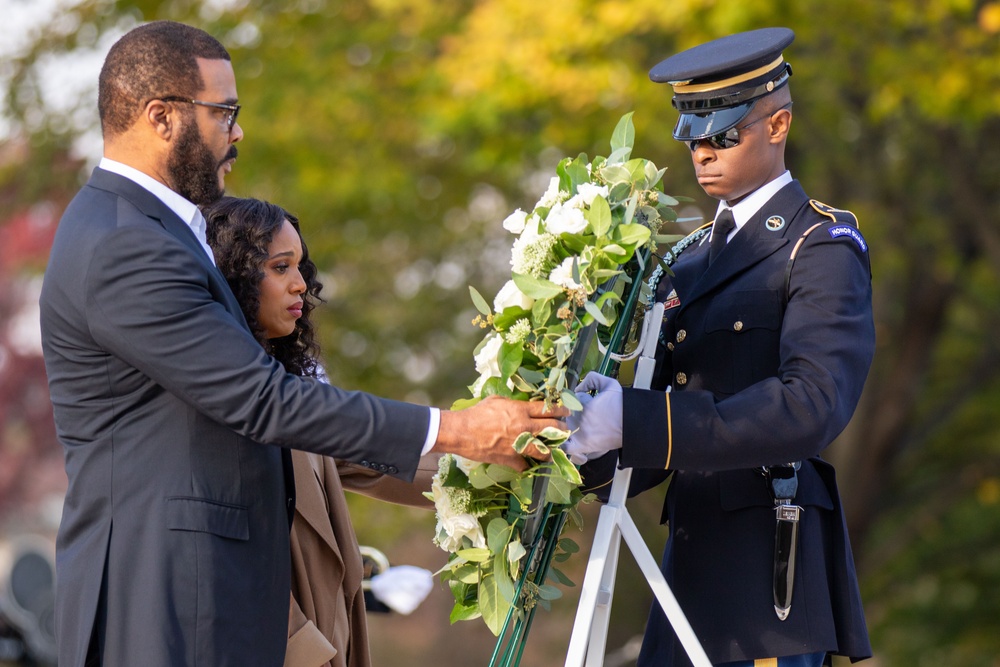 Tyler Perry, Kerry Washington and Ebony Obsidian lay a wreath at The Tomb of the Unknown Soldier