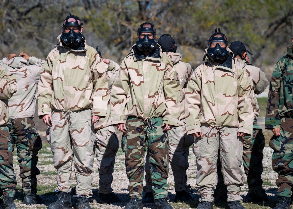 Trainees assigned to flights 100-103 participate in Mask Confidence Training Dec. 19, 2024