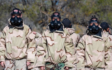 Trainees assigned to flights 100-103 participate in Mask Confidence Training Dec. 19, 2024