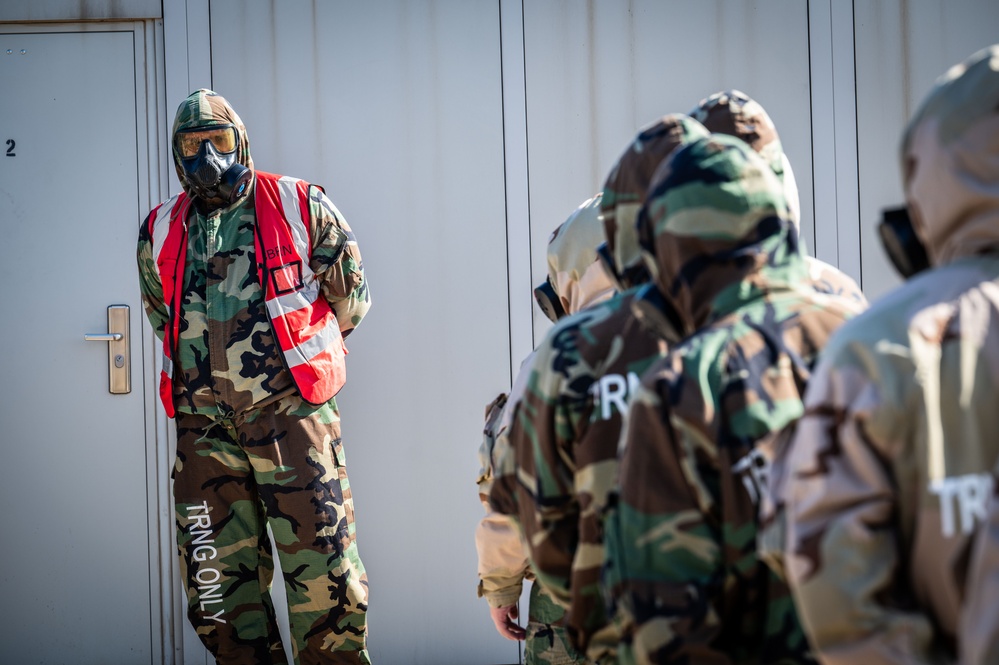 Trainees assigned to flights 100-103 participate in Mask Confidence Training Dec. 19, 2024