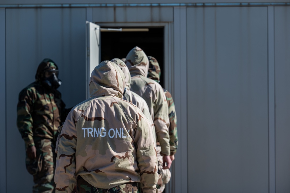 Trainees assigned to flights 100-103 participate in Mask Confidence Training Dec. 19, 2024