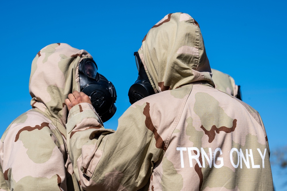 Trainees assigned to flights 100-103 participate in Mask Confidence Training Dec. 19, 2024