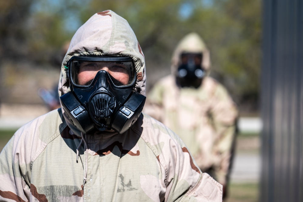 Trainees assigned to flights 100-103 participate in Mask Confidence Training Dec. 19, 2024