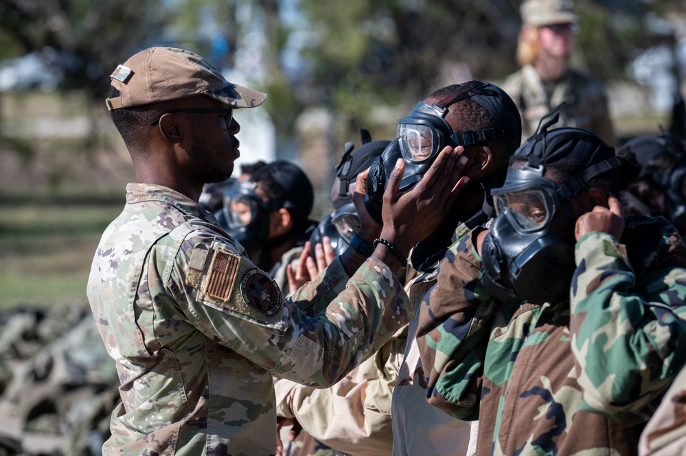 Trainees assigned to flights 100-103 participate in Mask Confidence Training Dec. 19, 2024