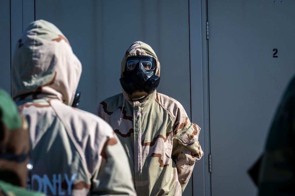 Trainees assigned to flights 100-103 participate in Mask Confidence Training Dec. 19, 2024