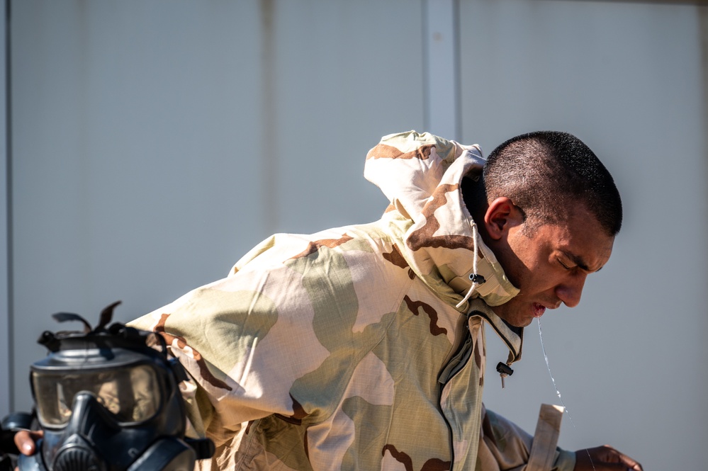 Trainees assigned to flights 100-103 participate in Mask Confidence Training Dec. 19, 2024