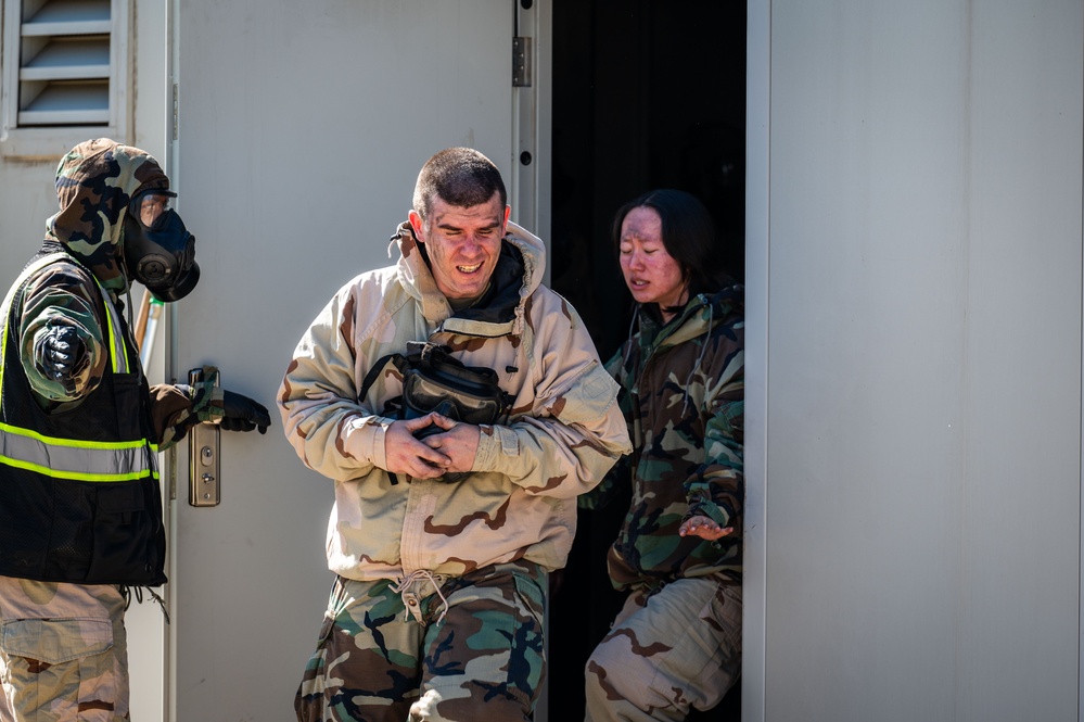 Trainees assigned to flights 100-103 participate in Mask Confidence Training Dec. 19, 2024