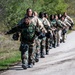 Trainees assigned to flights 100-103 participate in Mask Confidence Training Dec. 19, 2024