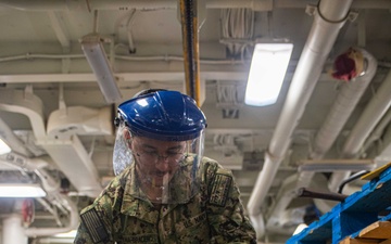 USS Ronald Reagan (CVN 76) performs aviation maintenance