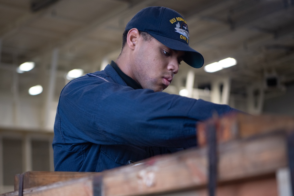 USS Ronald Reagan (CVN 76) Sailors perform supply offload