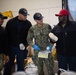 USS Ronald Reagan (CVN 76) Sailors perform supply offload