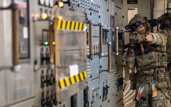 U.S. Navy SEALs Train with Coast Guard MSRT in VBSS Training