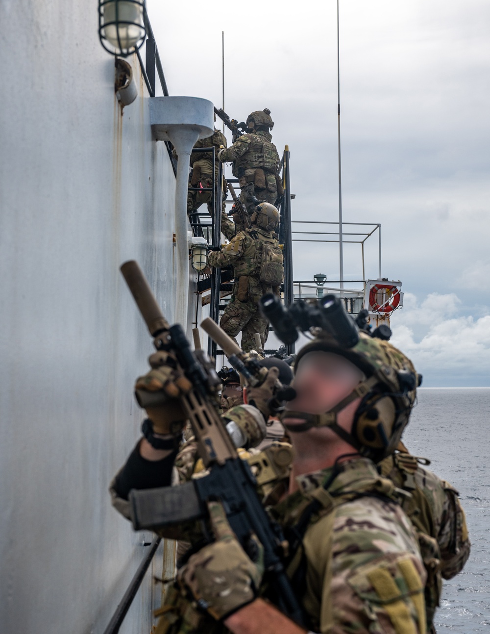 U.S. Navy SEALs Train with Coast Guard MSRT in VBSS Training