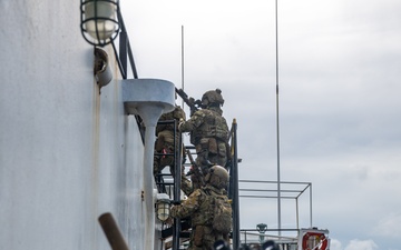 U.S. Navy SEALs Train with Coast Guard MSRT in VBSS Training