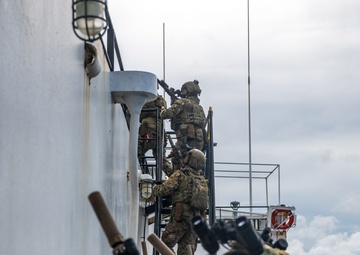 U.S. Navy SEALs Train with Coast Guard MSRT in VBSS Training