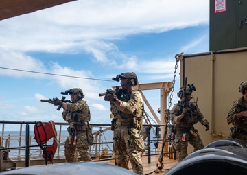 U.S. Navy SEALs Train with Coast Guard MSRT in VBSS Training