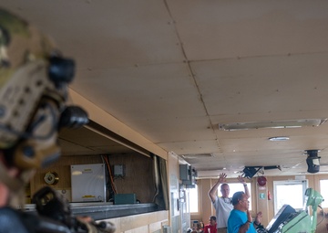 U.S. Navy SEALs Train with Coast Guard MSRT in VBSS Training