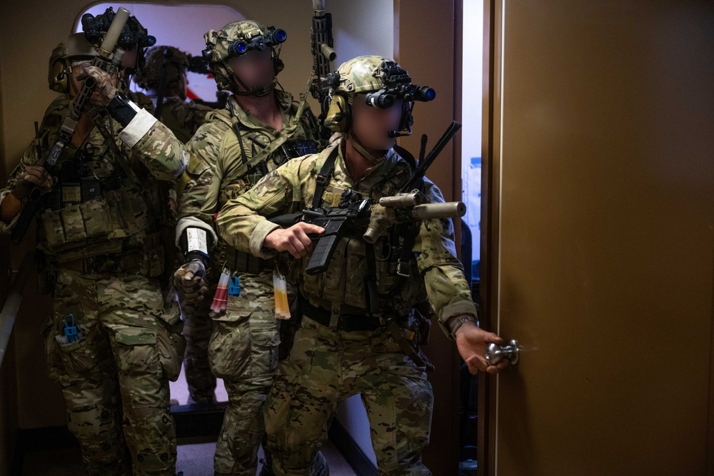 U.S. Navy SEALs Train with Coast Guard MSRT in VBSS Training