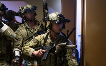 U.S. Navy SEALs Train with Coast Guard MSRT in VBSS Training