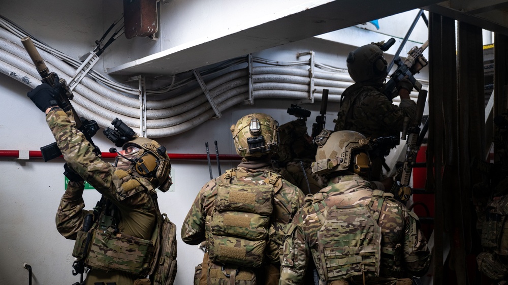 U.S. Navy SEALs Train with Coast Guard MSRT in VBSS Training