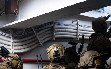 U.S. Navy SEALs Train with Coast Guard MSRT in VBSS Training