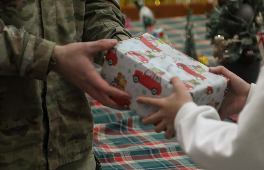 210 FAB Soldiers deliver holiday gifts to children in Dongducheon