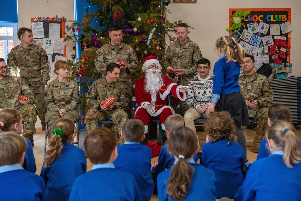 Pathfinders bring holiday cheer to local schools